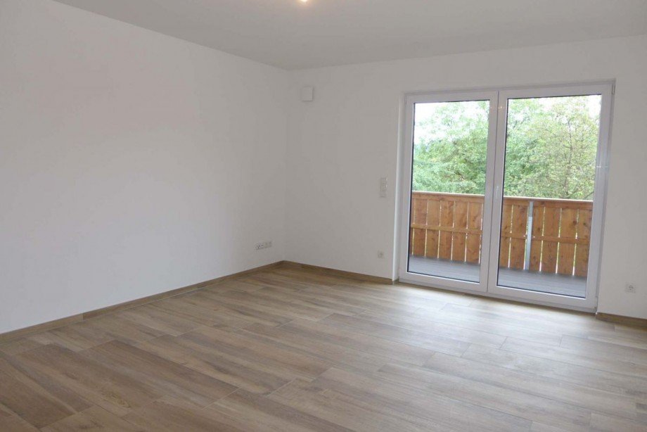 Wohnzimmer mit Balkon Etagenwohnung Prien