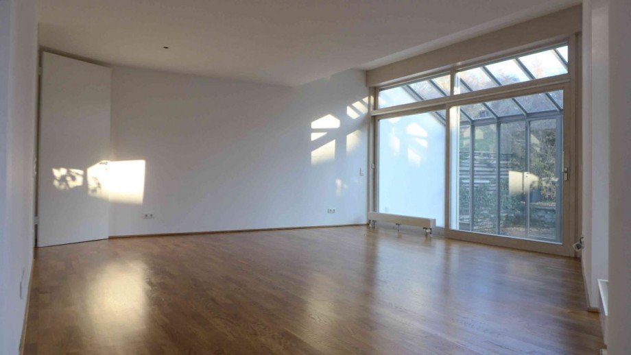 Wohnzimmer mit Wintergarten Doppelhaush�lfte Feldafing